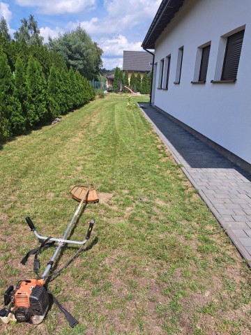 Usługi ogrodnicze koszenie trawy ciagniczkiem kosą spalinową