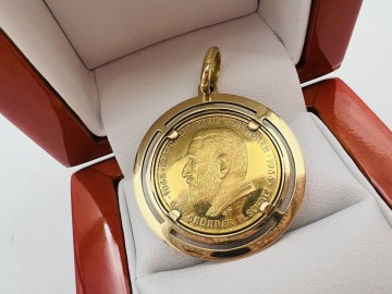 Złoty wisior próba 750 z moneta 999