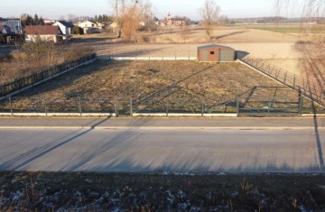 Działka budowlana-ogrodzona-blaszany garaż-gm. Kazimierz B.