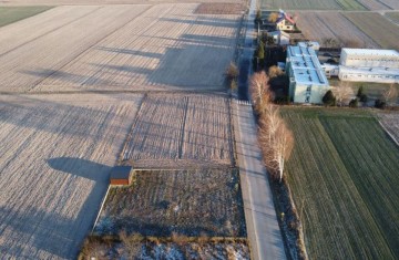 Działka budowlana-ogrodzona-blaszany garaż-gm. Kazimierz B.