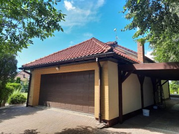 Atrakcyjna nieruchomość z pięknym, zagospodarowanym ogrodem